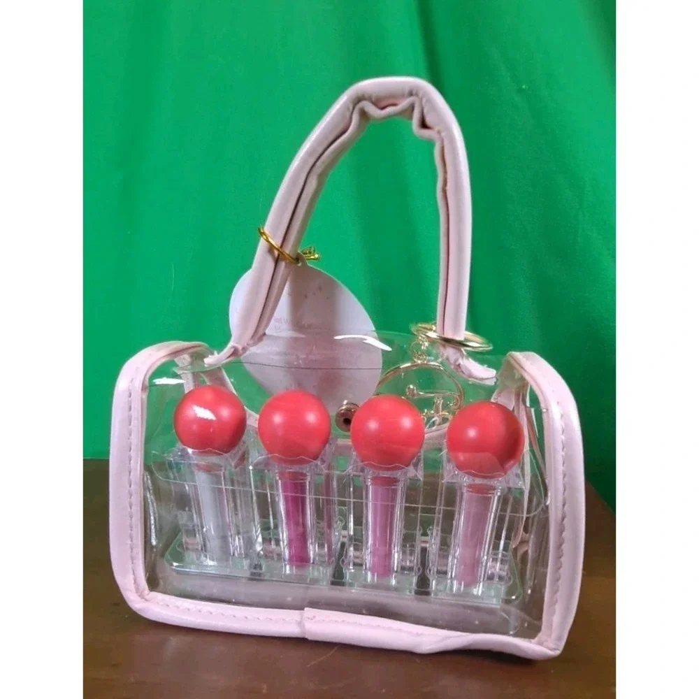 NIP FAO Schwarz Lipstick Set - 4pc with a Pink and Clear Purse - Pink Lilac Silv